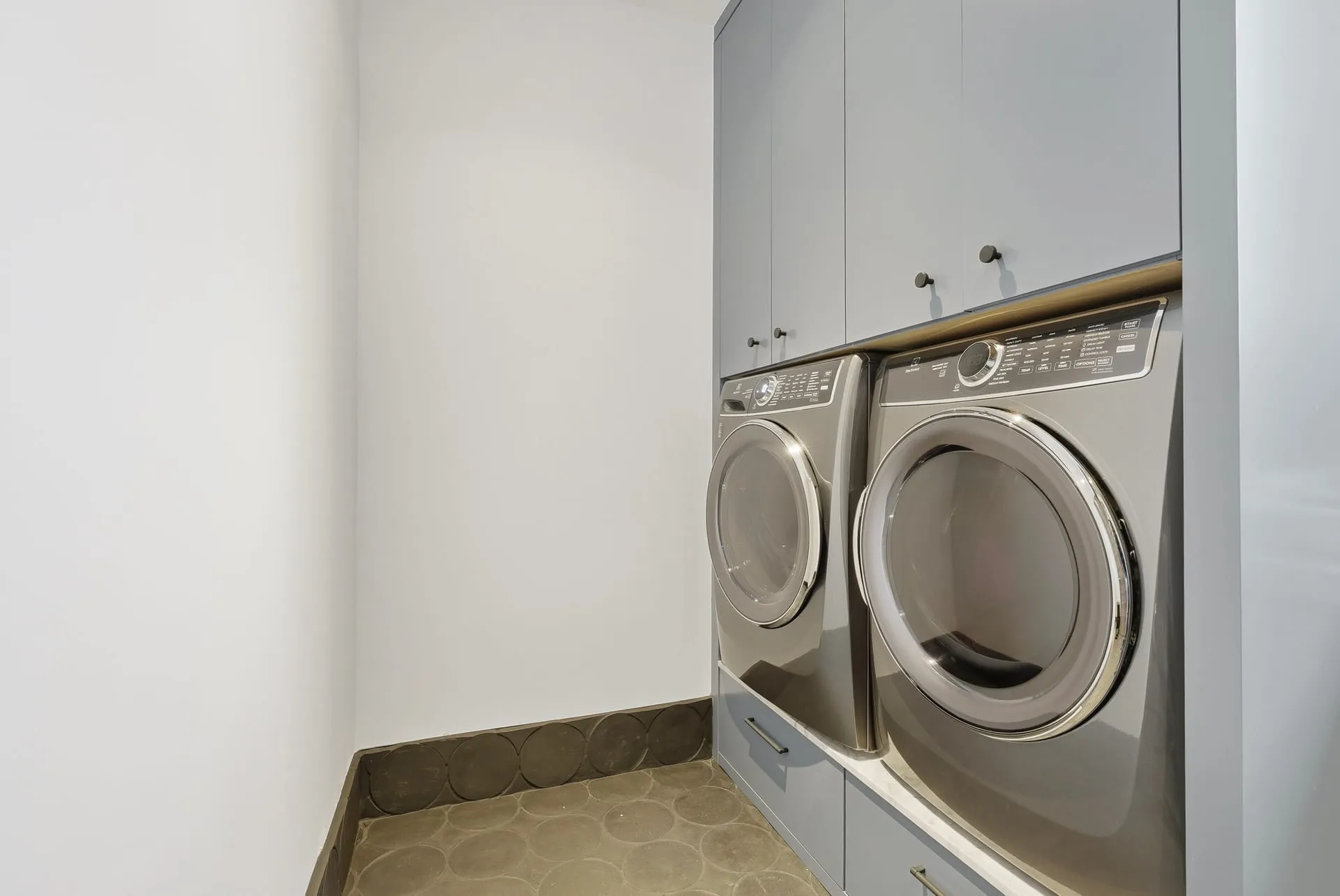 Laundry room stacked cabinets