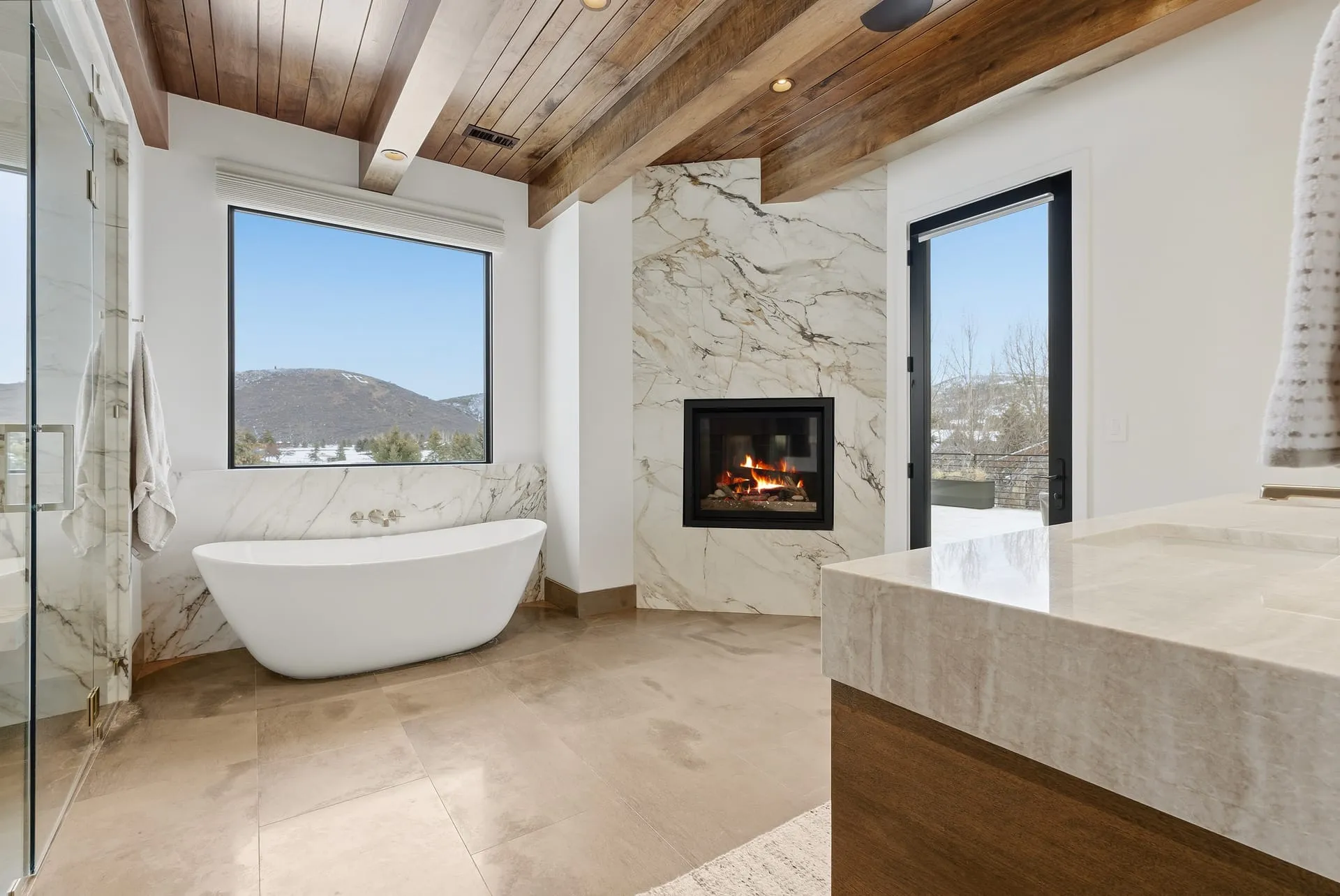 Master bath tub marble fireplace