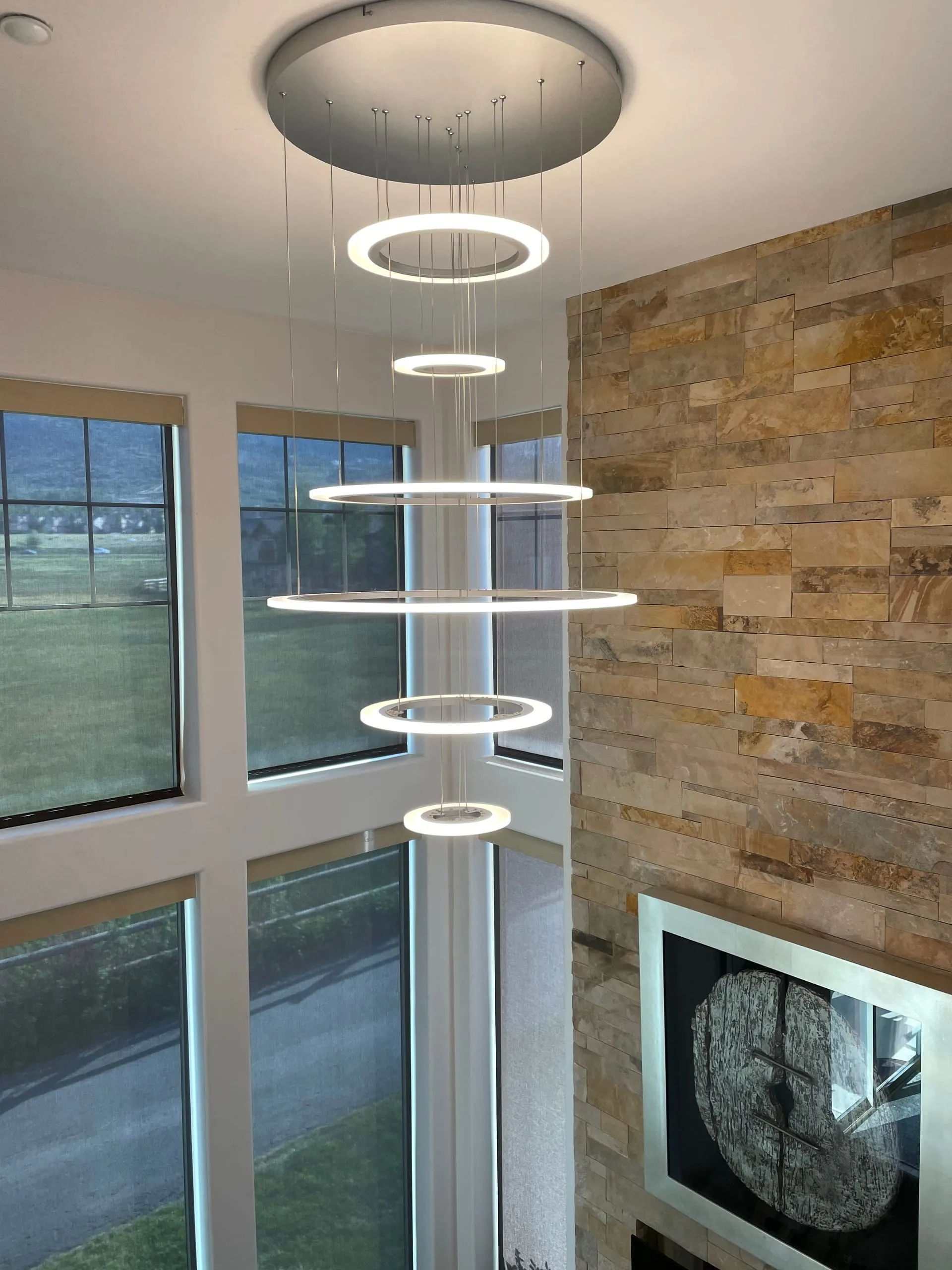 Stairwell multi tier ring chandelier